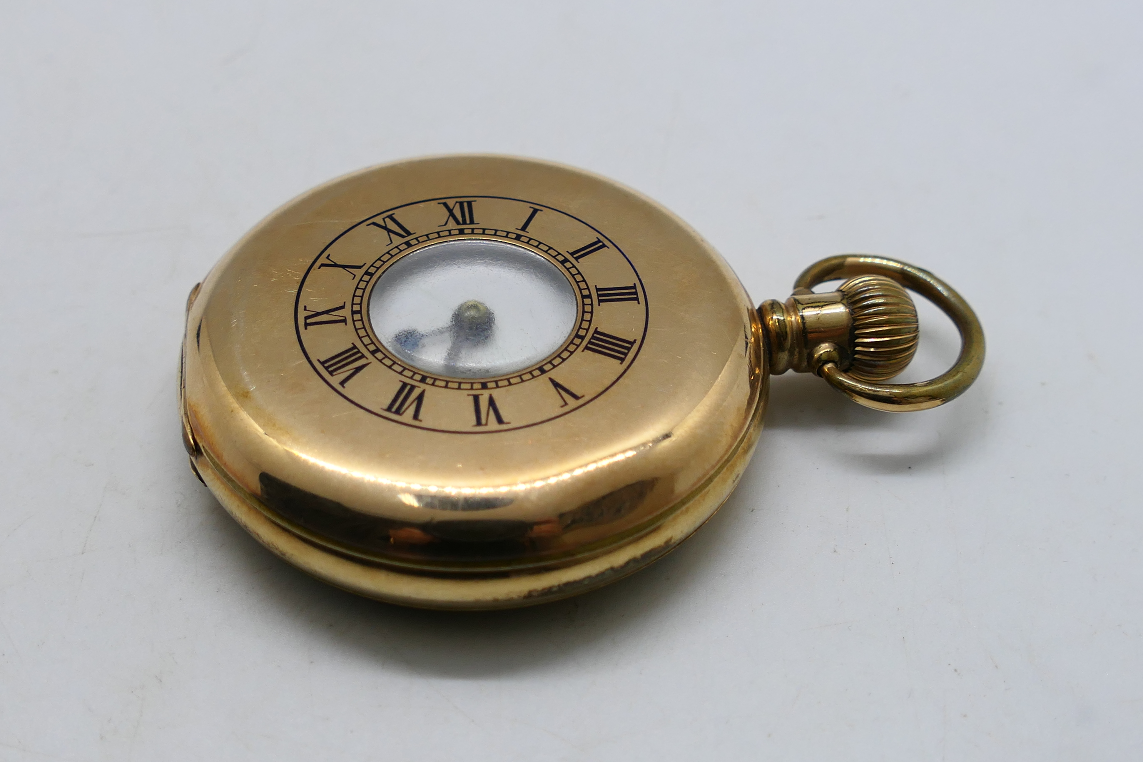 A gold plated half hunter pocket watch, Roman numerals to a white enamel dial, - Image 8 of 9