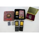 Zippo - Six cigarette lighters comprising a 60th Anniversary edition and 70th Anniversary edition,