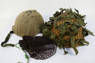 Two British military helmets comprising a Turtle and despatch riders helmet. [2].