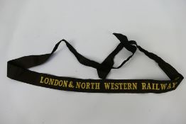 An unusual cap tally for London & North Western Railway Co.