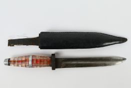 A World War Two (WW2 / WWII) period Czech fighting knife with 16 cm (l) blade stamped CZE over H,