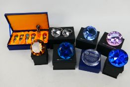 A collection of boxed paperweights to include Jordana Collection gemstone style examples and a set