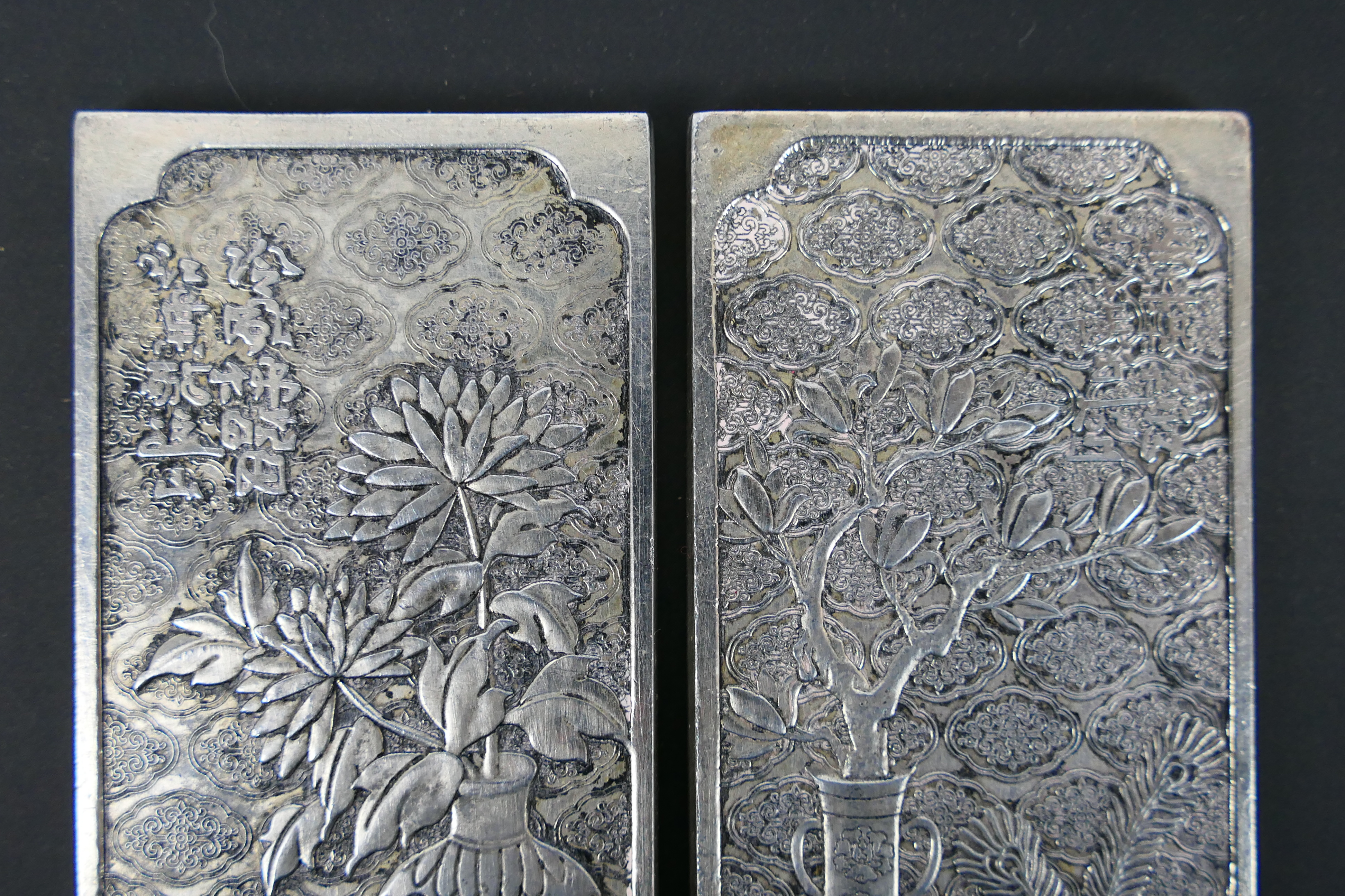 A pair of Chinese white metal plaques having bogu pattern decoration, 15 cm x 4.5 cm. - Image 2 of 7