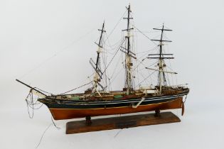 Model Ship - A three masted barque mounted to plinth, approximately 55 cm x 79 cm.