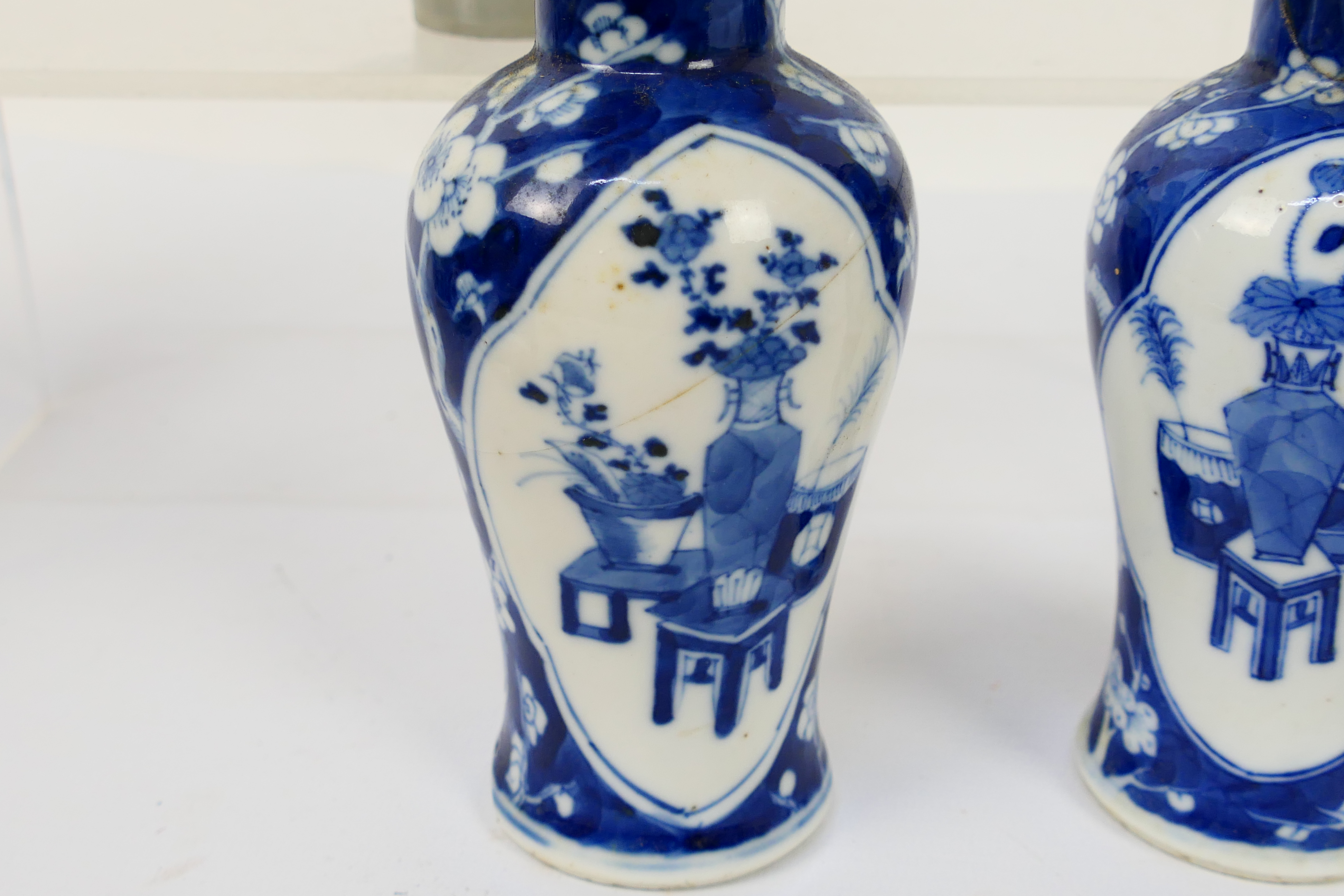 A group of 19th Century blue and white Chinese pottery covered vases of varying heights ranging - Image 21 of 36