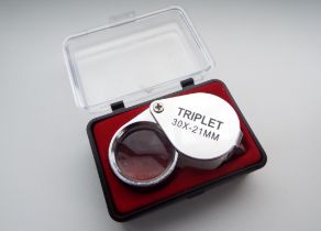 A jeweller's loupe, 30x magnification, new and unused, cased.