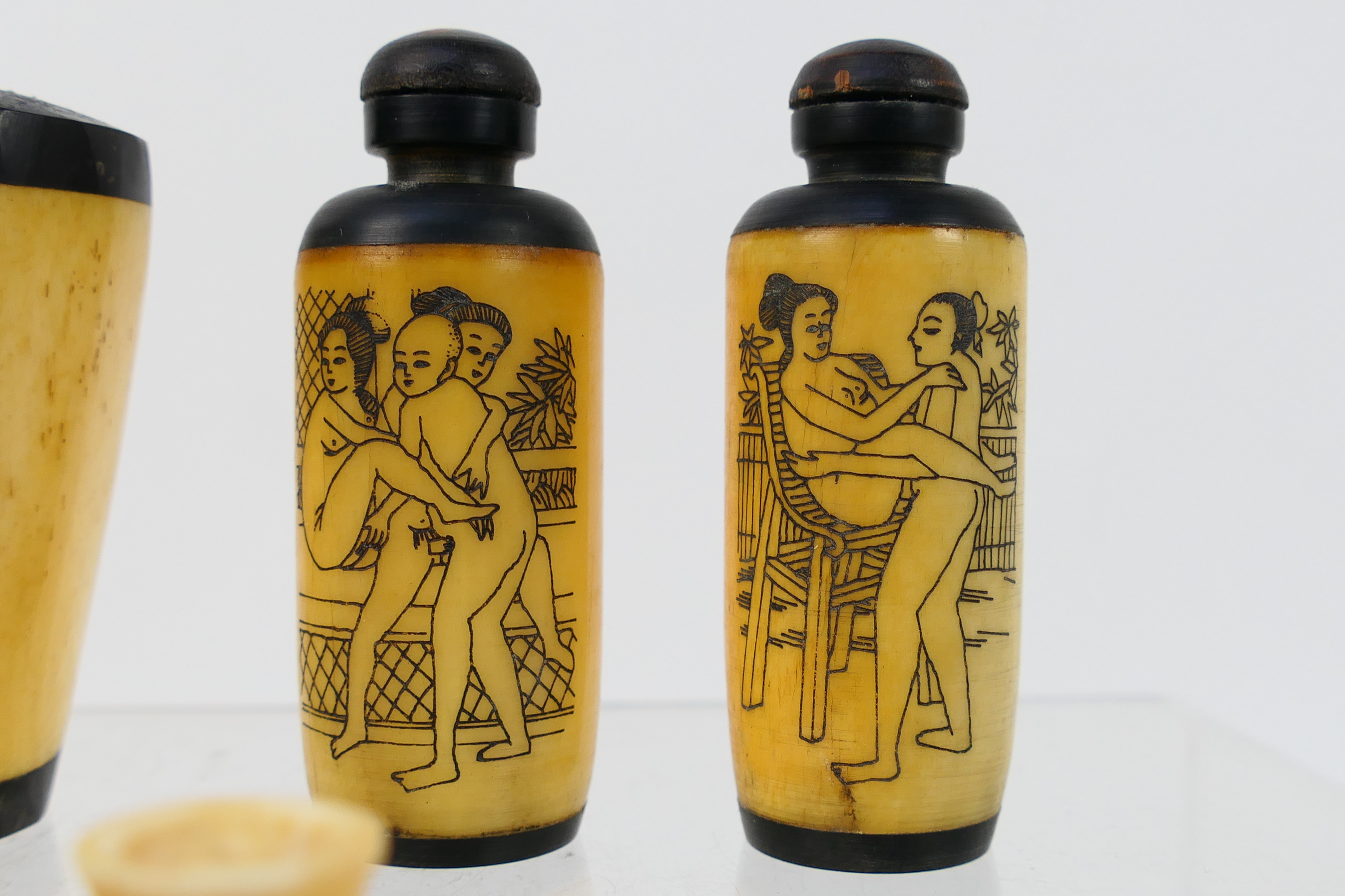 A grouping of bone and horn snuff bottles, four decorated with erotic scenes. [W]. - Image 4 of 7