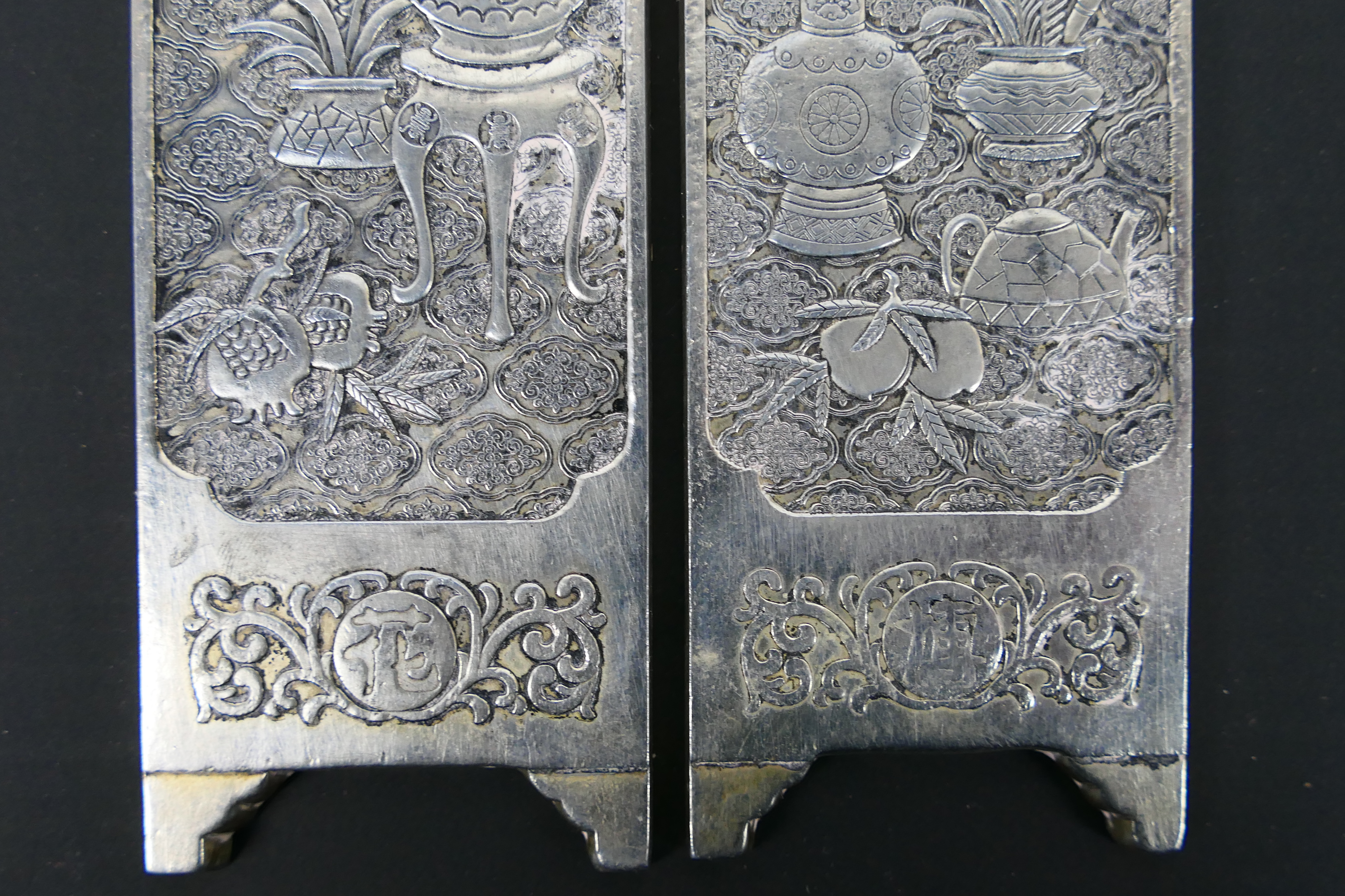 A pair of Chinese white metal plaques having bogu pattern decoration, 15 cm x 4.5 cm. - Image 4 of 7