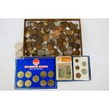 A collection of coins, decimal coin set and a 1980 Olympics medal collection.
