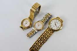 Three lady's gold plated bracelet watches