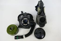 An M17 type respirator and one other.