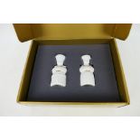 Lladro - A boxed set of Privilege Gold salt and pepper pots in the form of young monks,