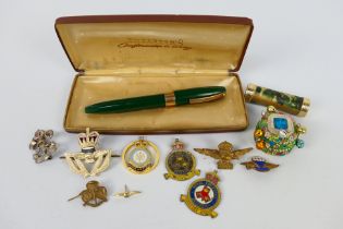 Lot to include an RAF sweetheart brooch, RAF badges, silver Kings Regiment badge and other.