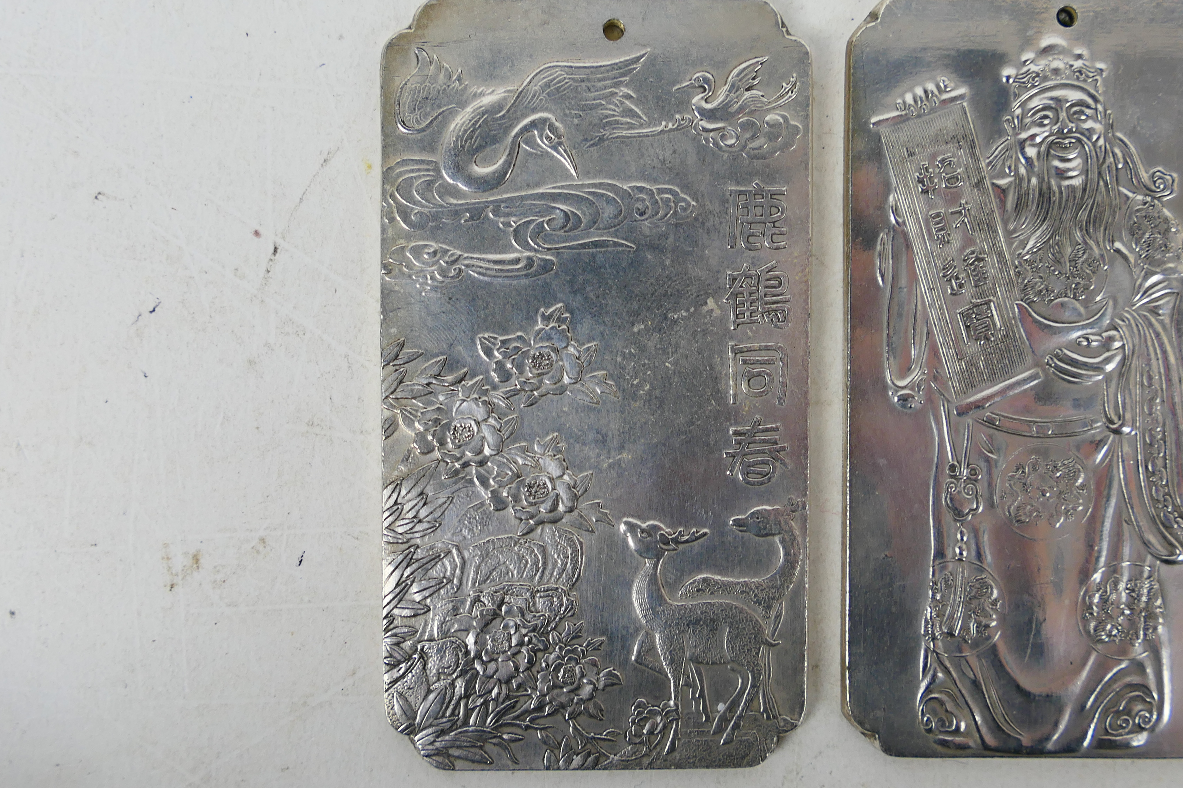 Two Chinese white metal trade tokens / plaques one decorated with cranes and deer, - Image 2 of 6