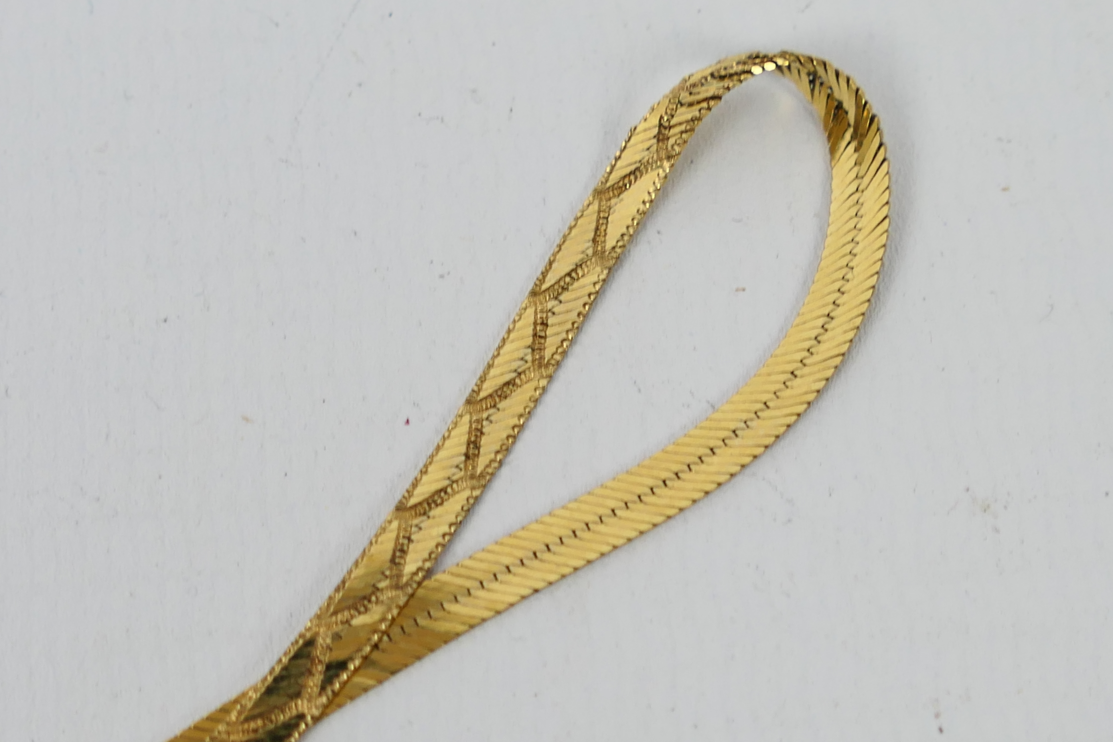 A yellow metal necklace stamped .375 (9 carat), approx 44 cm (length), approx weight 5. - Image 2 of 4