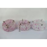 A set of three mid-century marbled glass ceiling lights, approximately 27 cm (d).