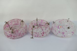 A set of three mid-century marbled glass ceiling lights, approximately 27 cm (d).