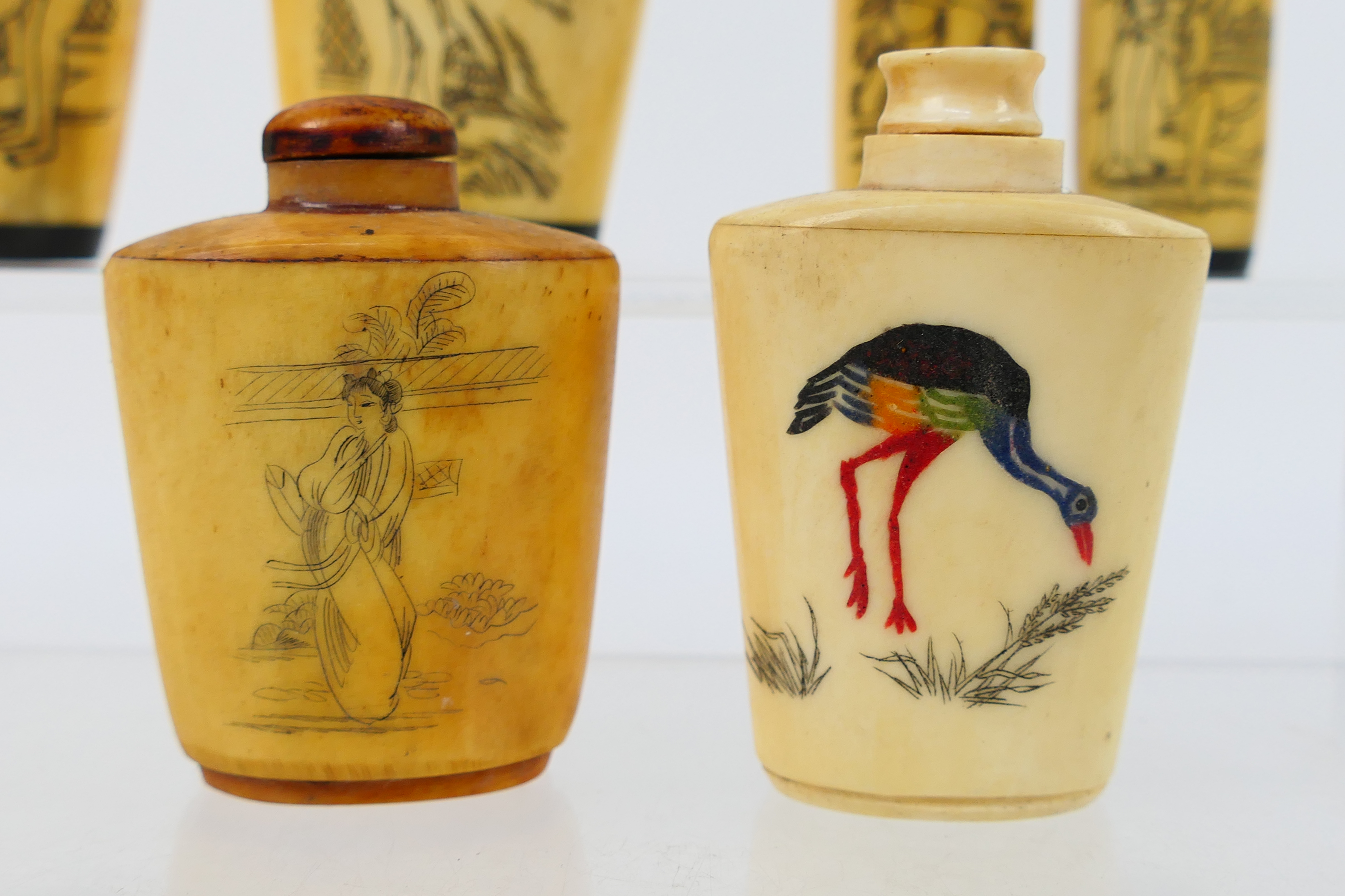 A grouping of bone and horn snuff bottles, four decorated with erotic scenes. [W]. - Image 6 of 7