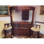 Old Charm Furniture - a Bar with decorative archway carvings # 1702 and canopy above # 1713,
