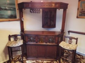 Old Charm Furniture - a Bar with decorative archway carvings # 1702 and canopy above # 1713,