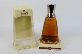 A 70cl bottle of Bells Millennium 2000 8 year old whisky, 40% abv, contained in presentation box.