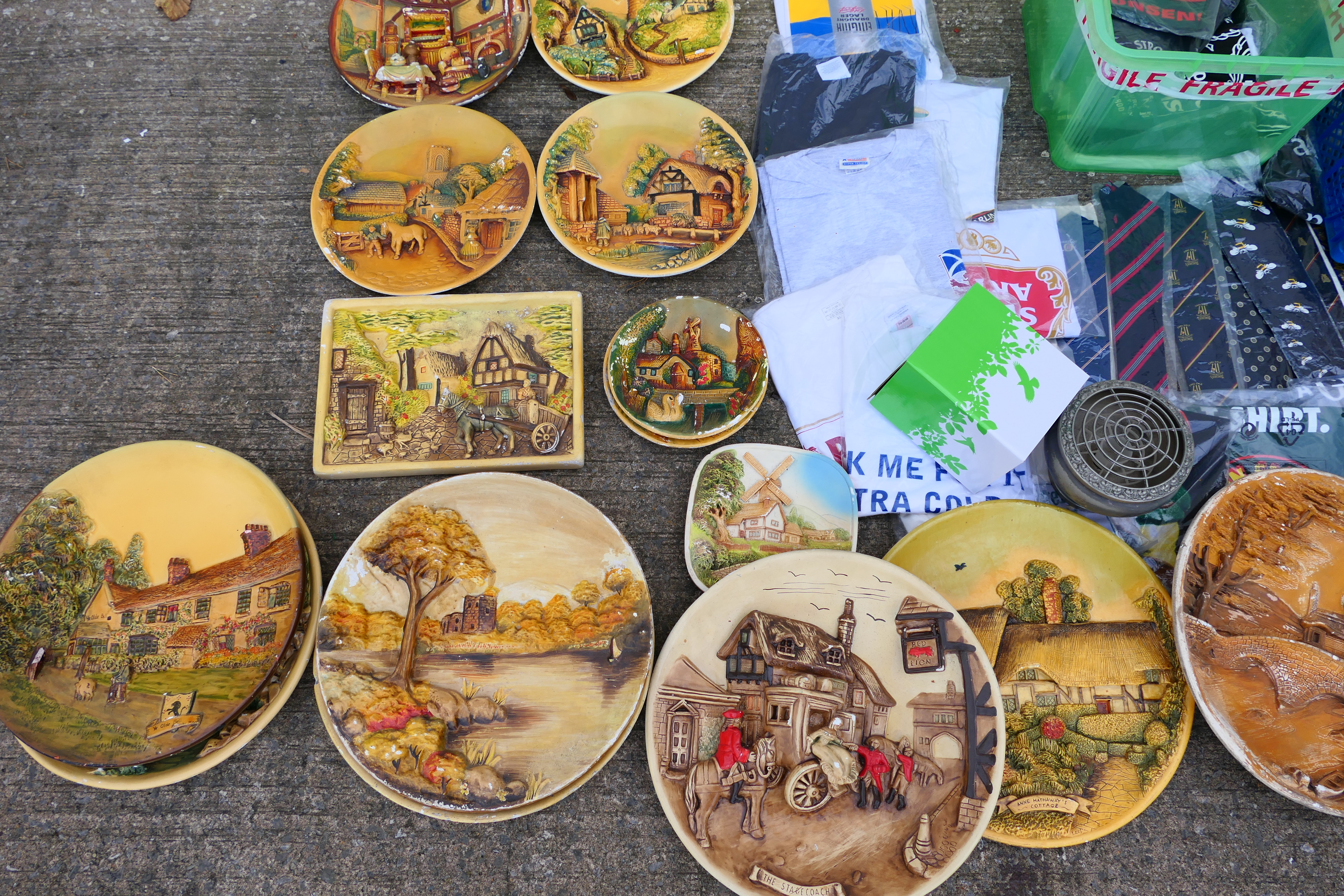 A collection of plaster wall plaques, largest approximately 37 cm (d), a quantity of T shirts, - Image 2 of 6