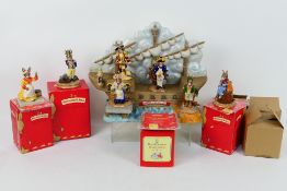 Royal Doulton - HMS Bunnykins display stand and seven figures to include Captain, Pirate, Cook,