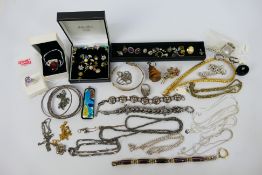A collection of costume jewellery to include rings, necklaces, bracelets, earrings,