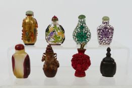 A collection of snuff bottles to include ceramic, glass, hardstone and other.