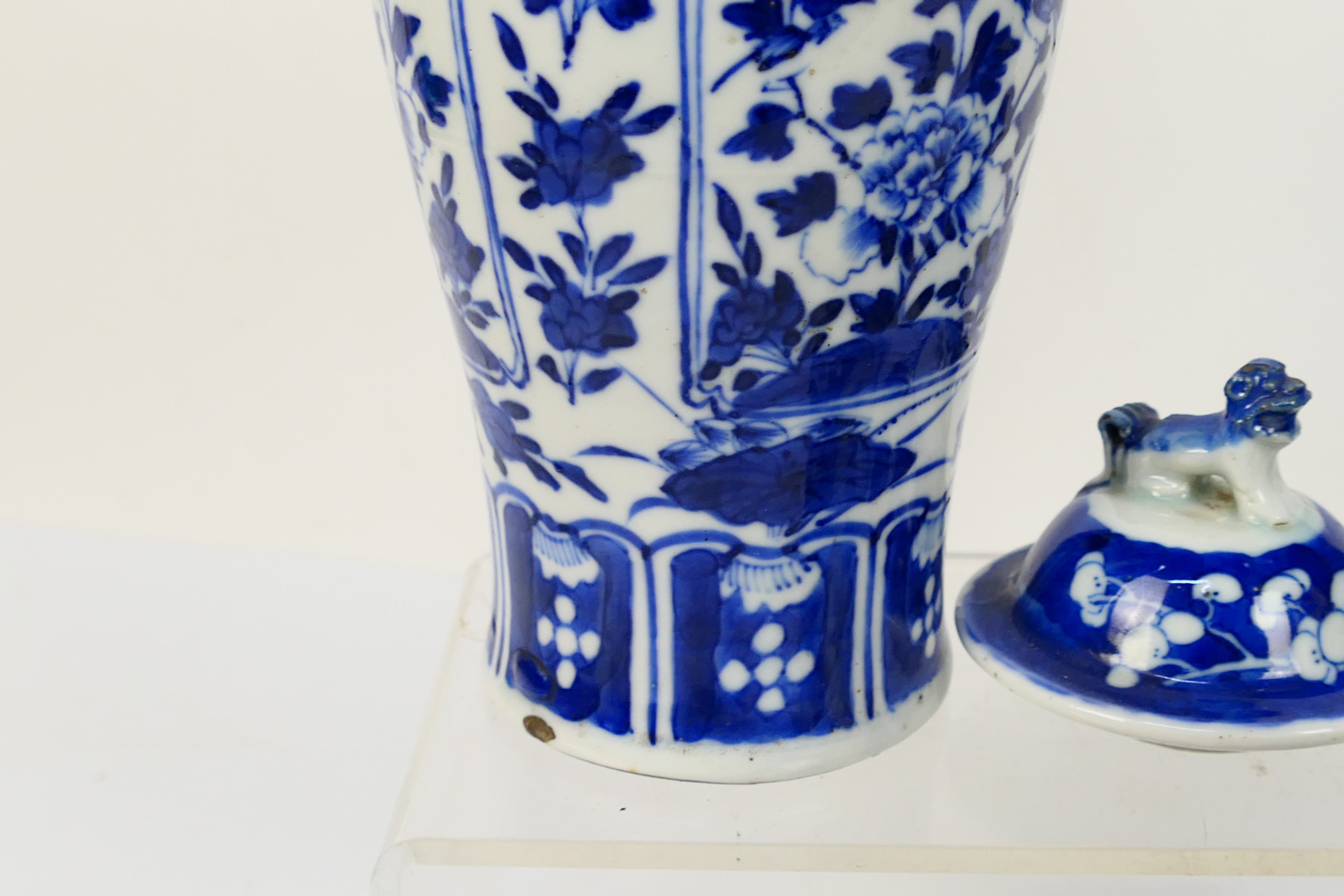 A group of 19th Century blue and white Chinese pottery covered vases of varying heights ranging - Image 6 of 36