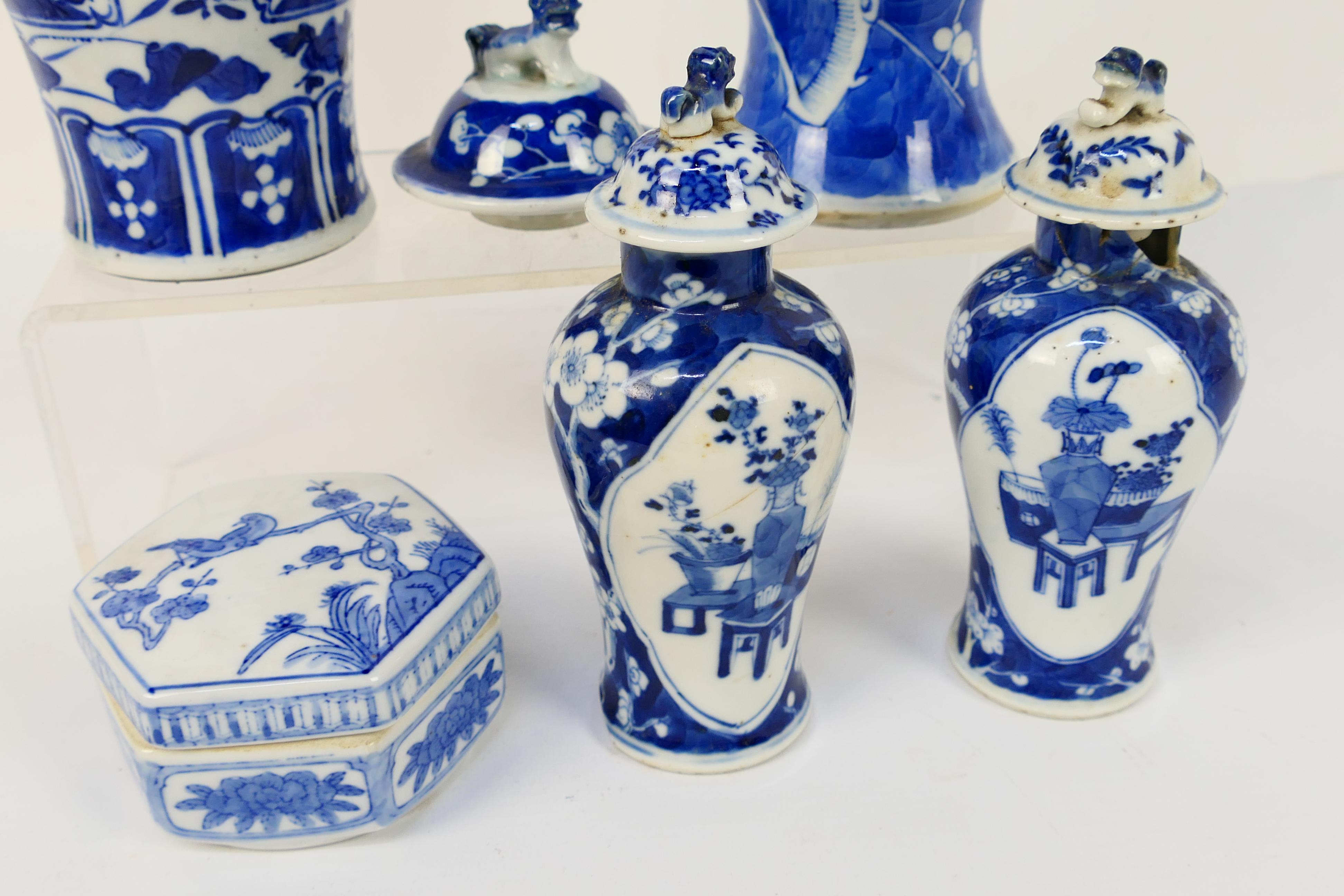 A group of 19th Century blue and white Chinese pottery covered vases of varying heights ranging - Image 3 of 36