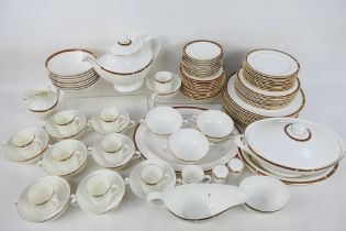 A quantity of dinner and tea wares by Royal Doulton for St Michael in the Connaught pattern,