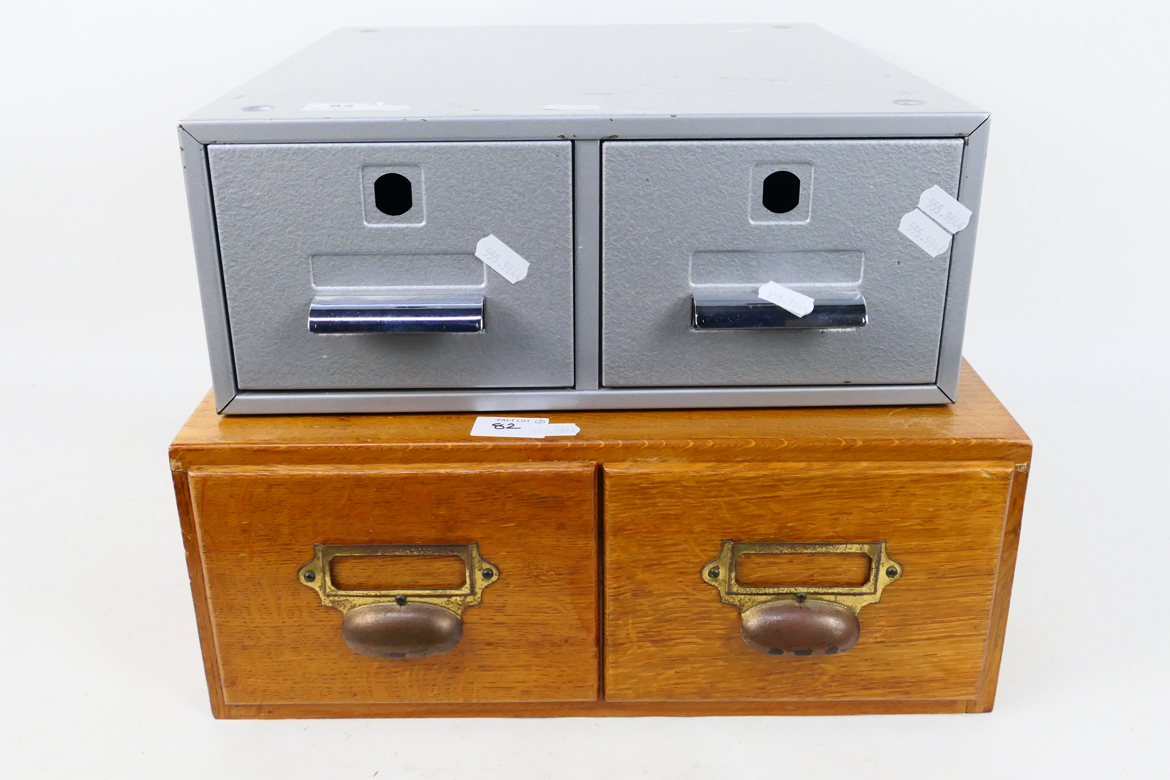 A vintage wooden two drawer card index file and a similar metal example,