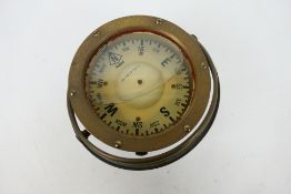 A Sestrel brass cased marine compass.