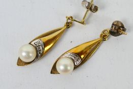 A pair of 9ct yellow gold Pearl and Diamond drop earrings, approx weight 3.
