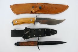 Two knives comprising a Colt fighting knife # CT585 contained in sheath and a Maserin, Italy. [2].