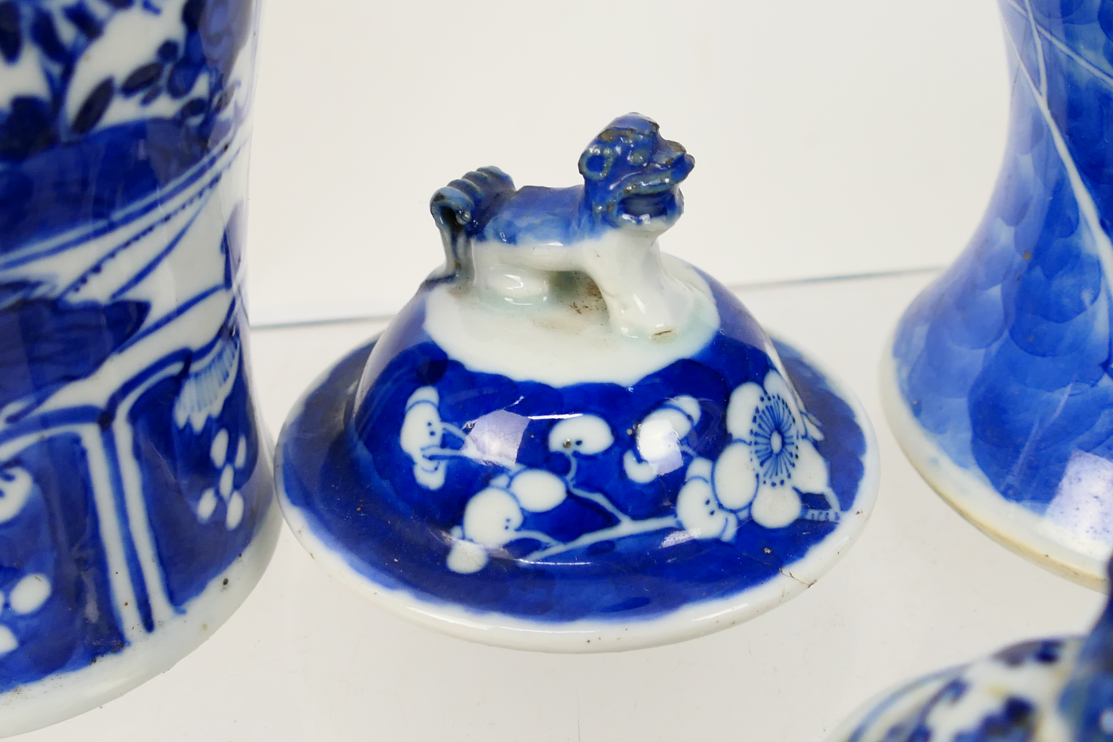 A group of 19th Century blue and white Chinese pottery covered vases of varying heights ranging - Image 7 of 36