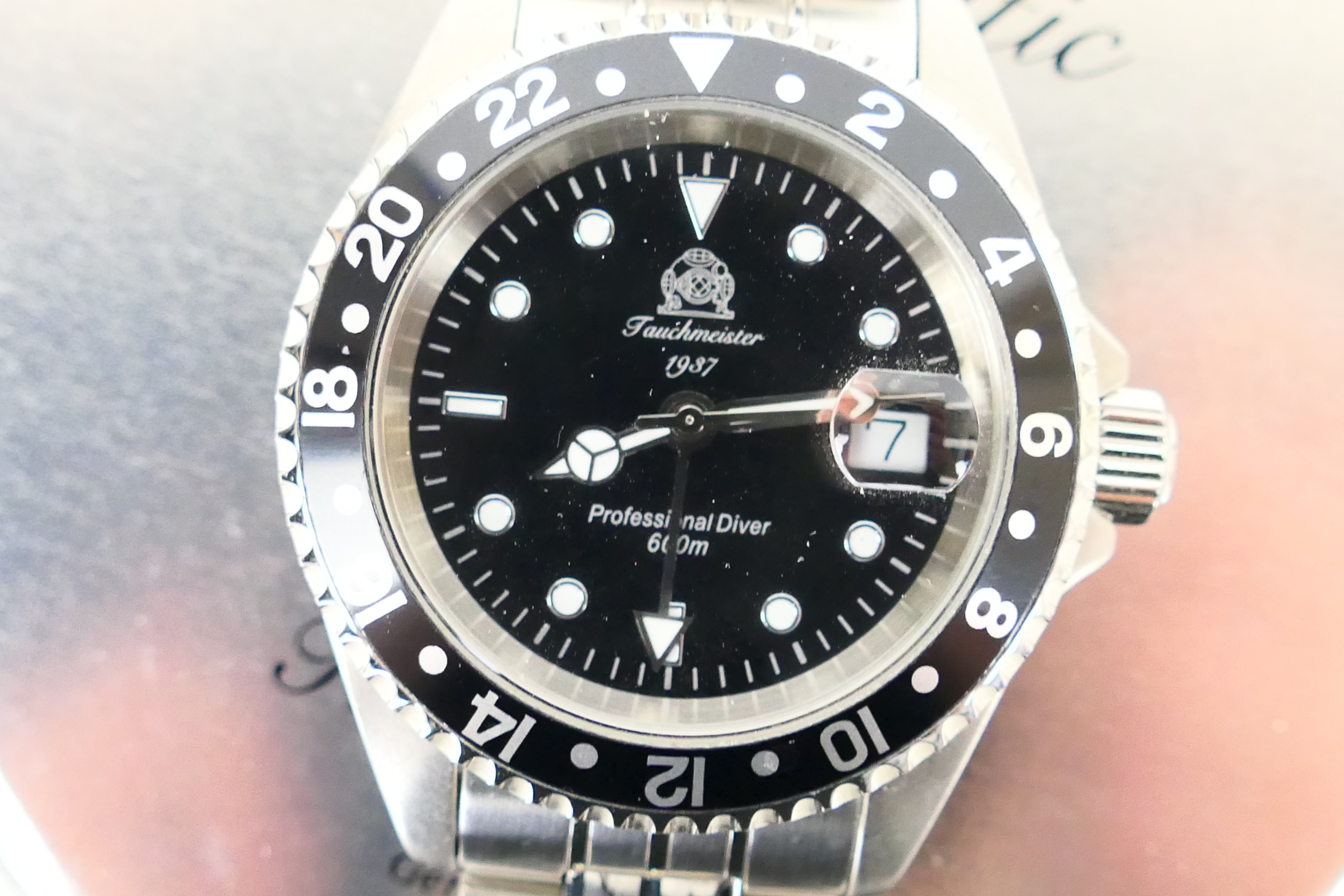 A Tauchmeister diver's wrist watch, black dial and bezel, on stainless steel bracelet, - Image 2 of 4