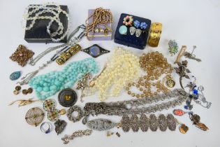 A collection of costume jewellery to include necklaces, brooches, ear studs, bracelet and other.