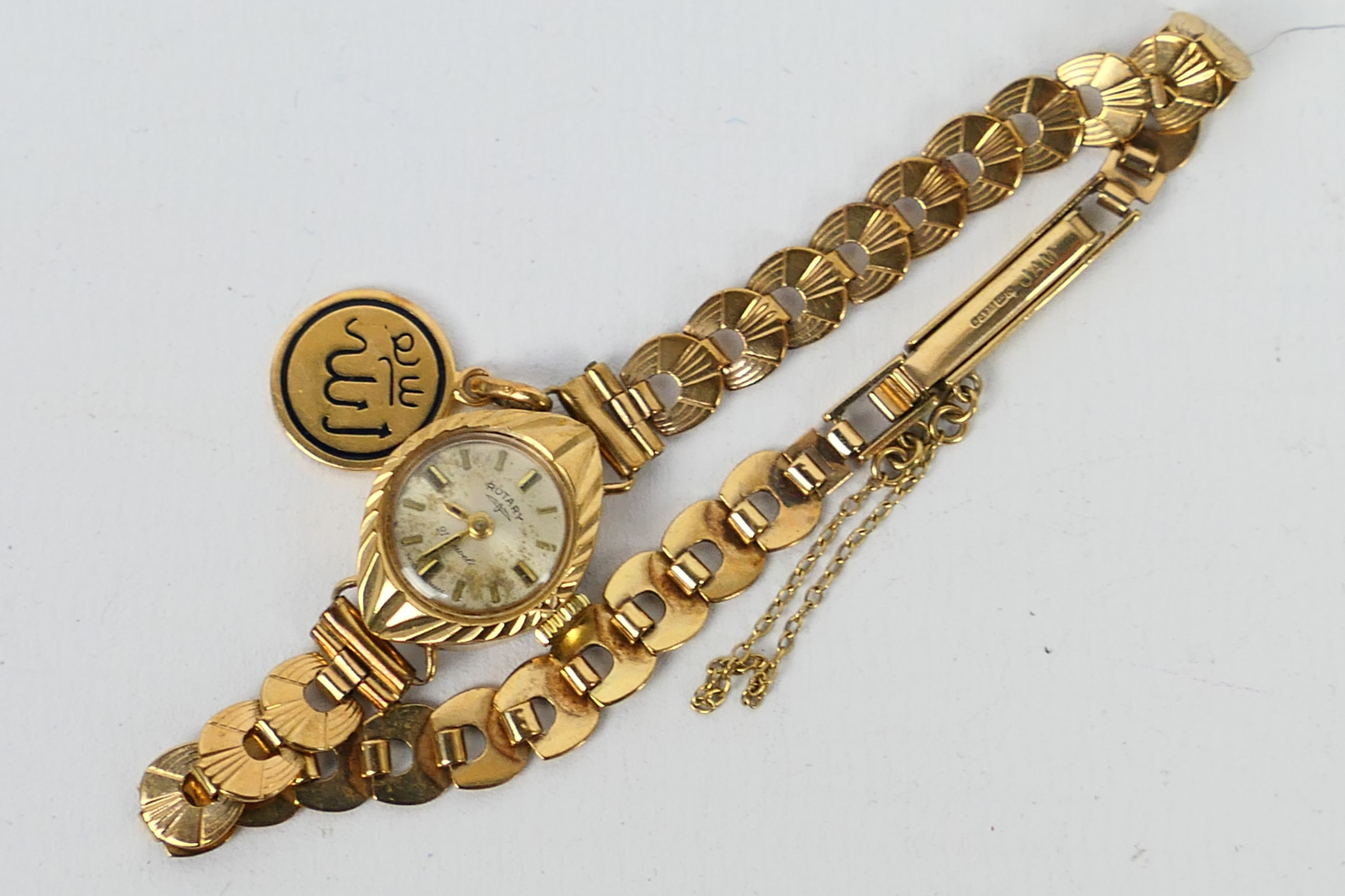 A lady's 9 carat gold Rotary watch, the circular dial with gilt hands and dagger batons,