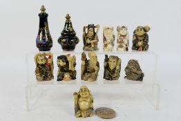 A group of Asian style figures and similar, largest approximately 5.5 cm (h).