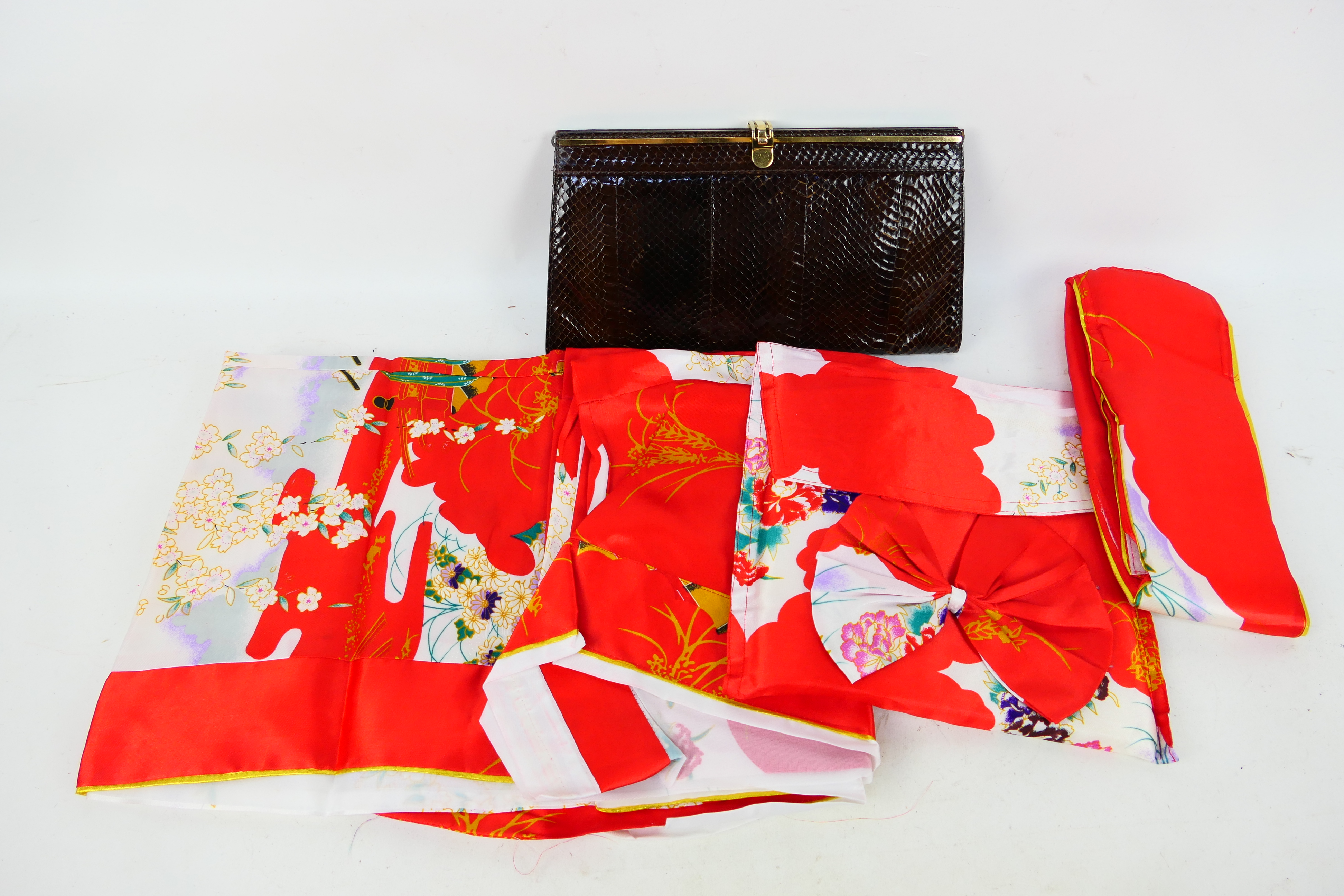 A vintage reptile skin hand bag and Japanese kimono.