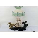 Lot to include a figural table lamp, ornamental brass horse, binoculars and other.