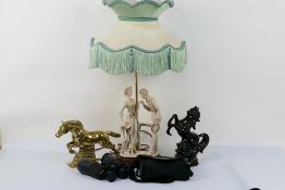 Lot to include a figural table lamp, ornamental brass horse, binoculars and other.