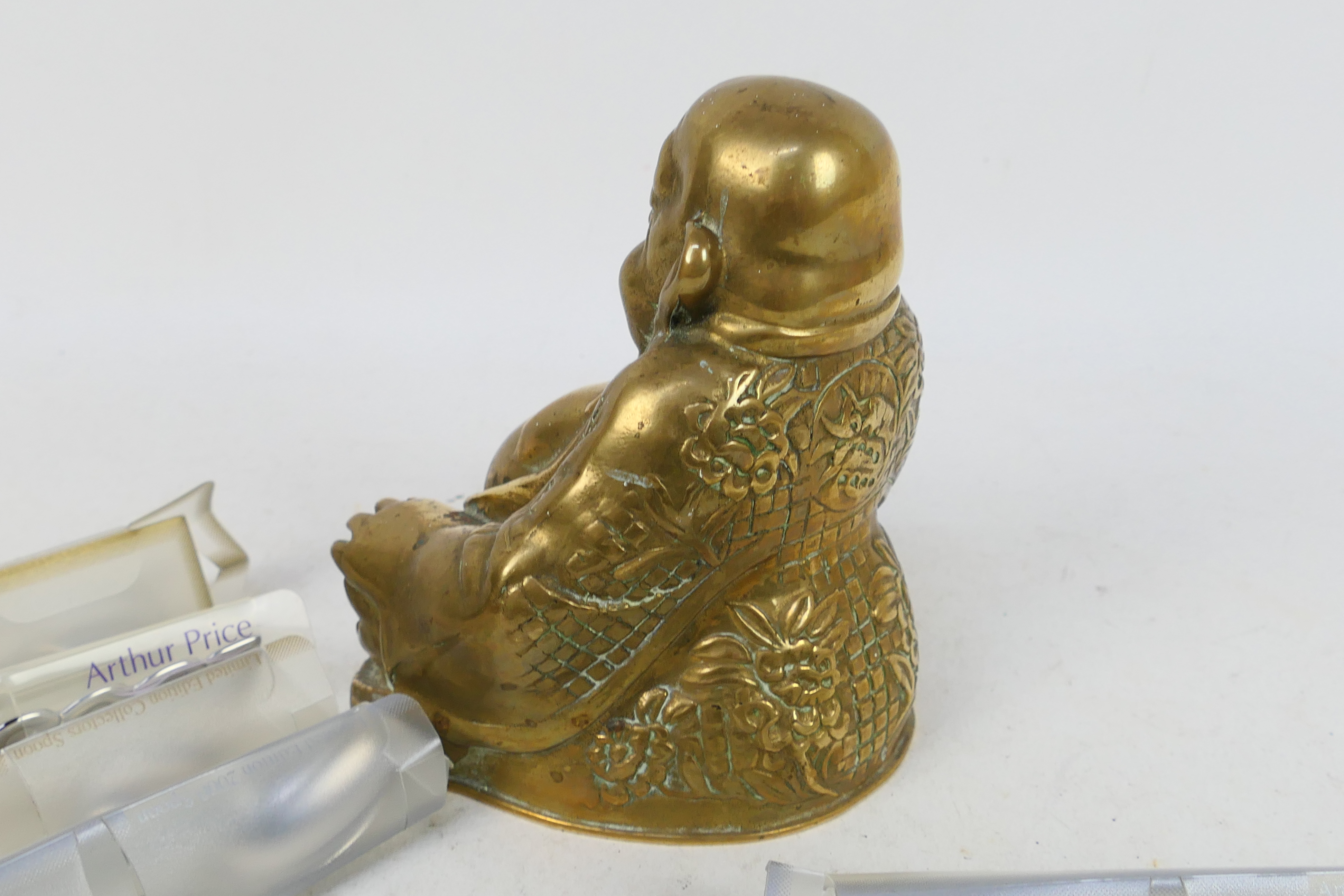 A brass figure depicting Budai, 14 cm (h) and six Arthur Price collector spoons. - Image 3 of 4