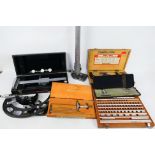 A collection of scientific / industrial equipment to include micrometers,