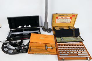 A collection of scientific / industrial equipment to include micrometers,