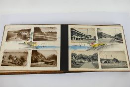 Deltiology - A vintage Japanese postcard album with inlaid black lacquer covers housing postcards