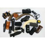 Lot to include knife sheaths, camera, binoculars, monocular scope,