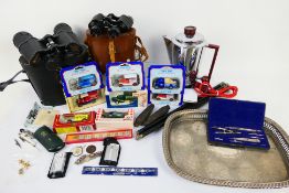 Lot to include plated tray, cased binoculars, boxed diecast cars, technical drawing set,